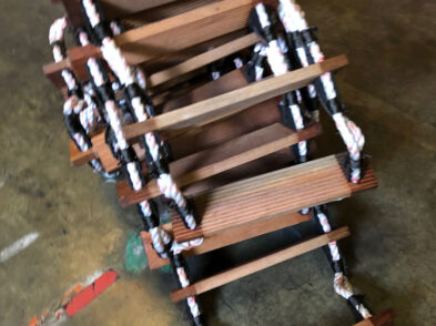 Rope Ladder black and white half way rolled up