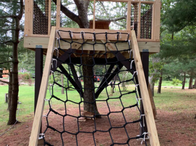 Tree house with a climbing net