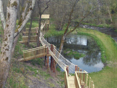 Bridge with nets along a lake